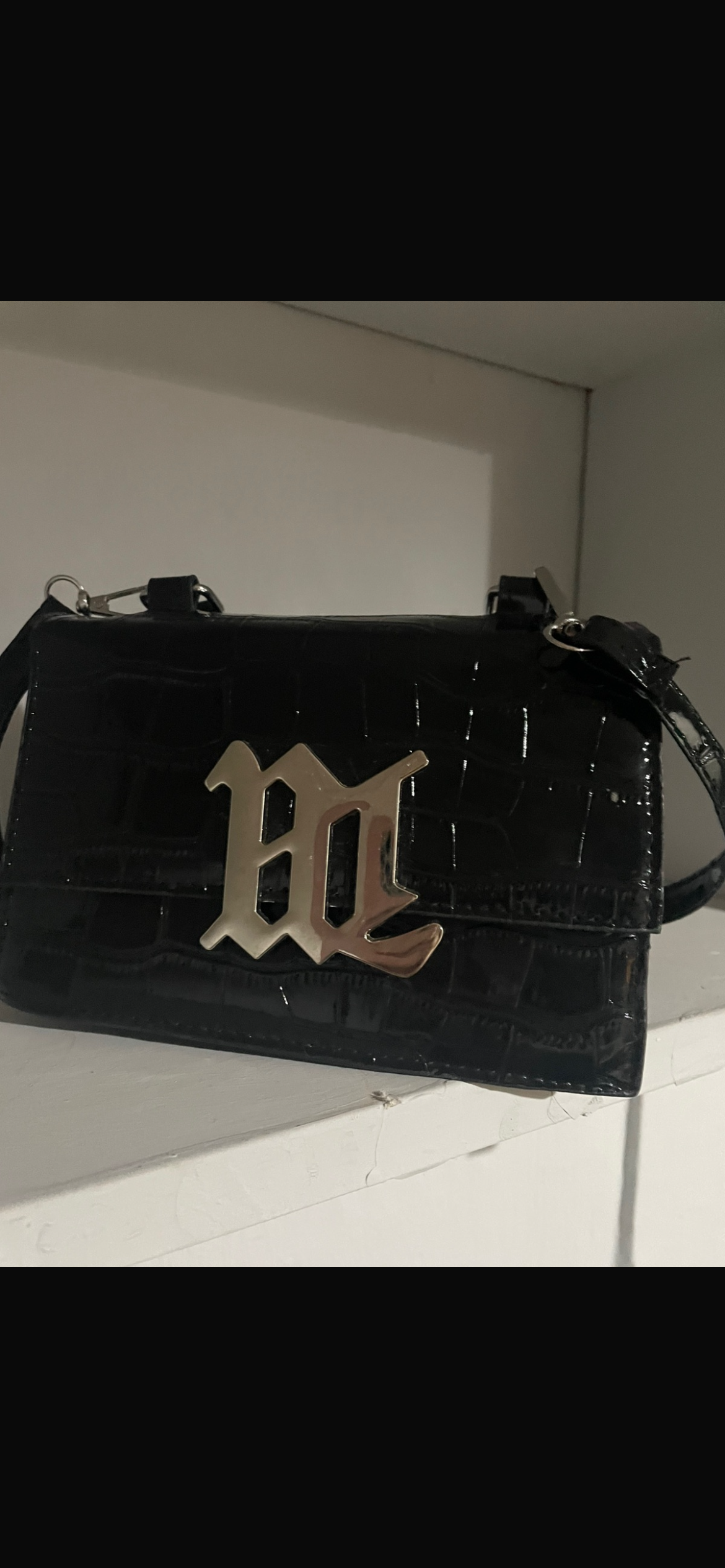 Cartera Night con correa regulable